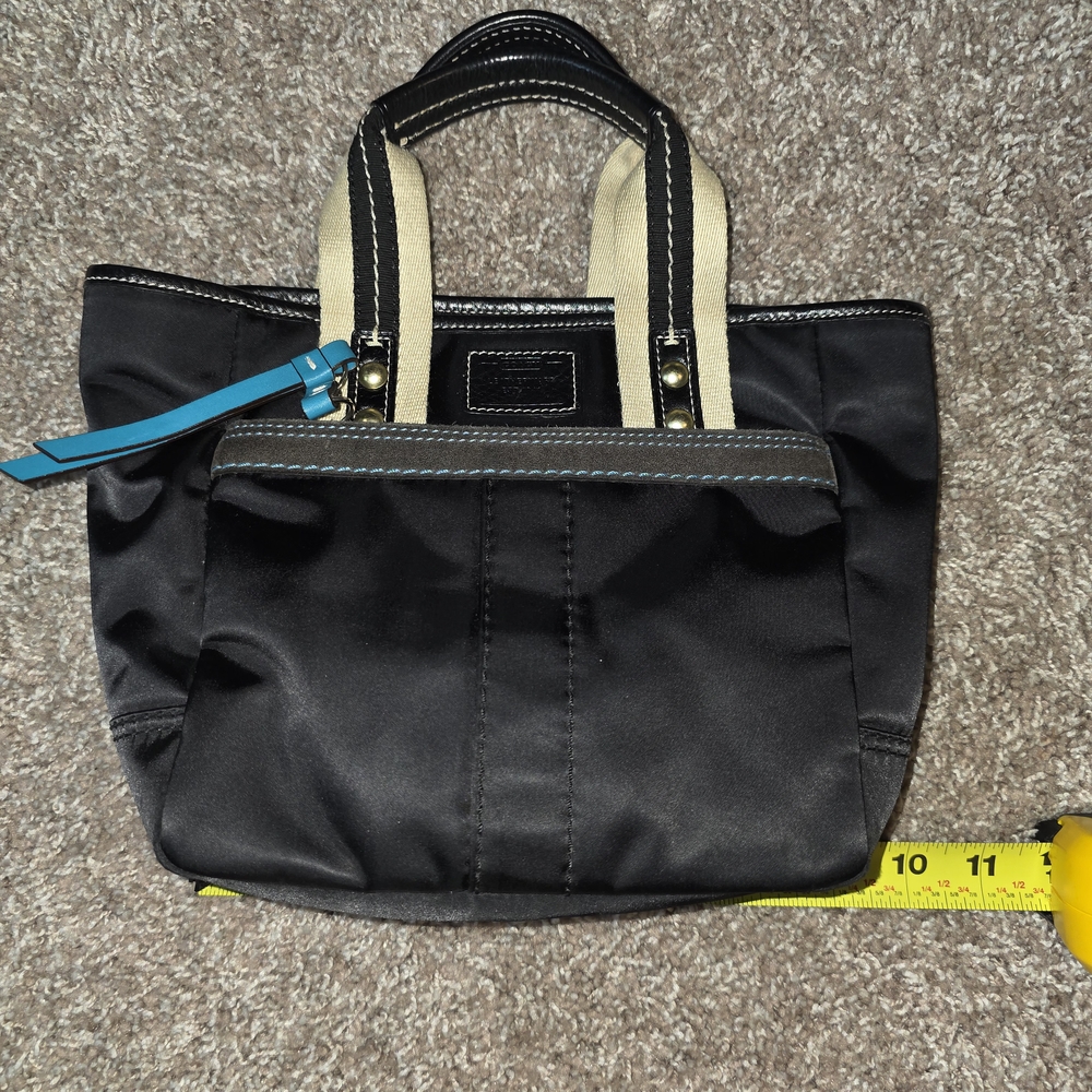 Coach Black and Tan Shoulder Bag with Structured Design